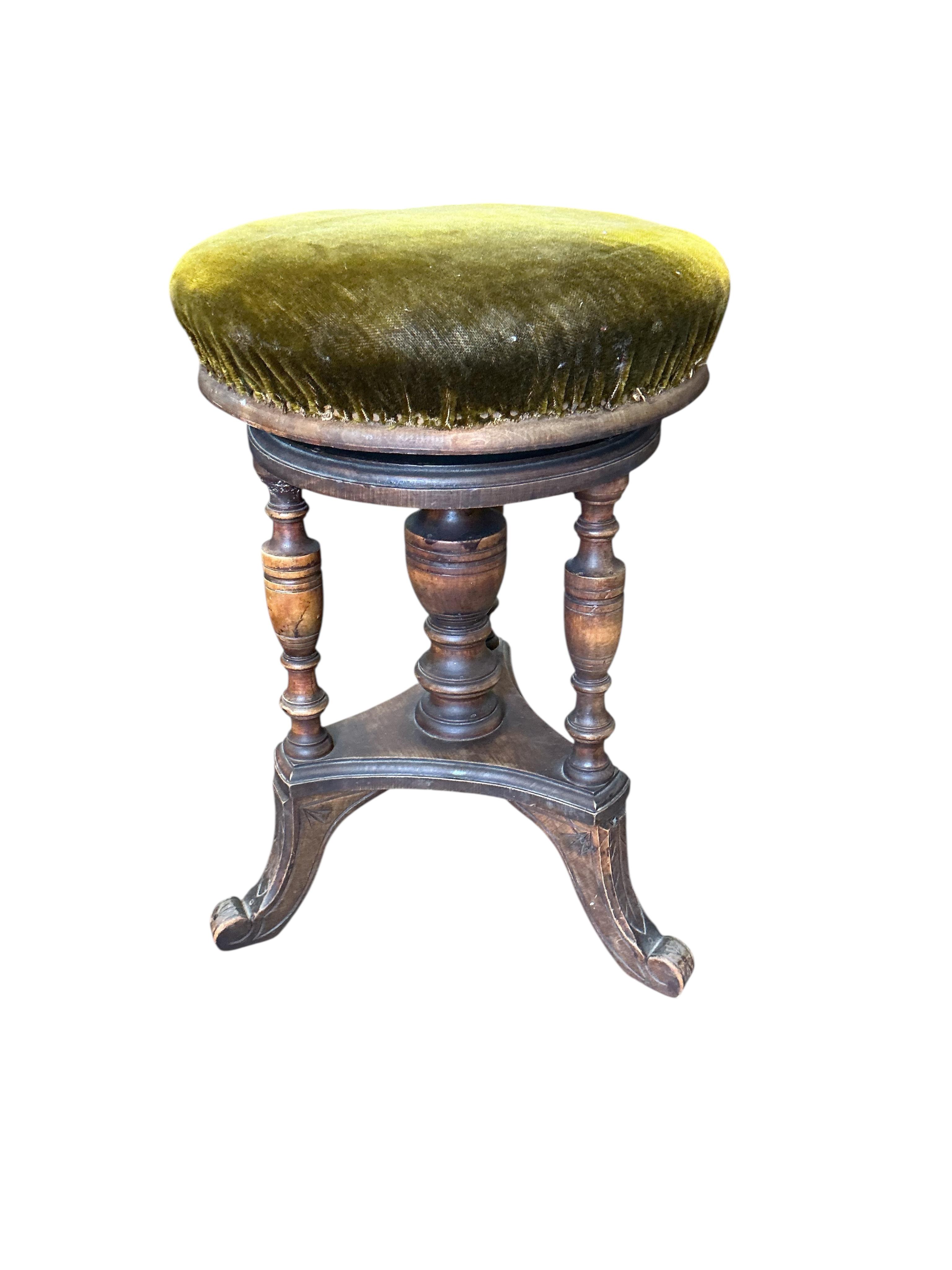 A late Victorian carved oak square two tier table, 59cm, height 66cm, together with a Victorian piano stool, a wall bracket and a Balinese wall mirror